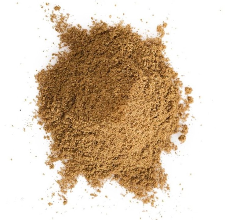 a pile of lightly toasted garam masala spice on a white background