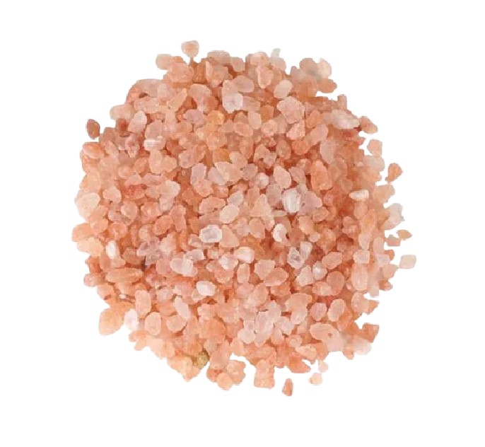 Coarse pink Himalayan rock salt grouped in a loose circle with a white background